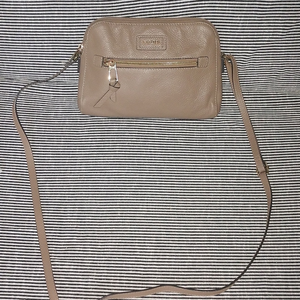 Lodis taupe leather crossbody bag.